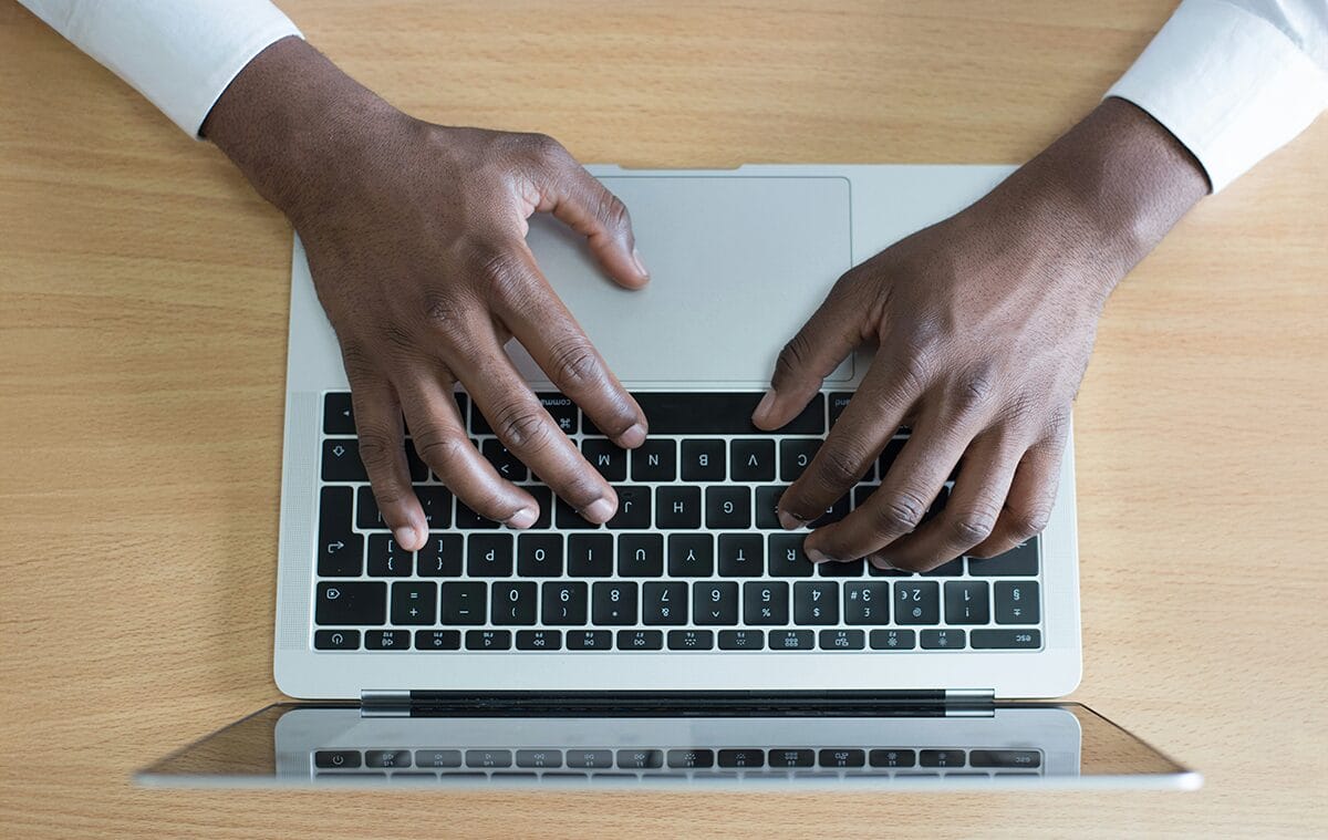 Person typing about employee tenure