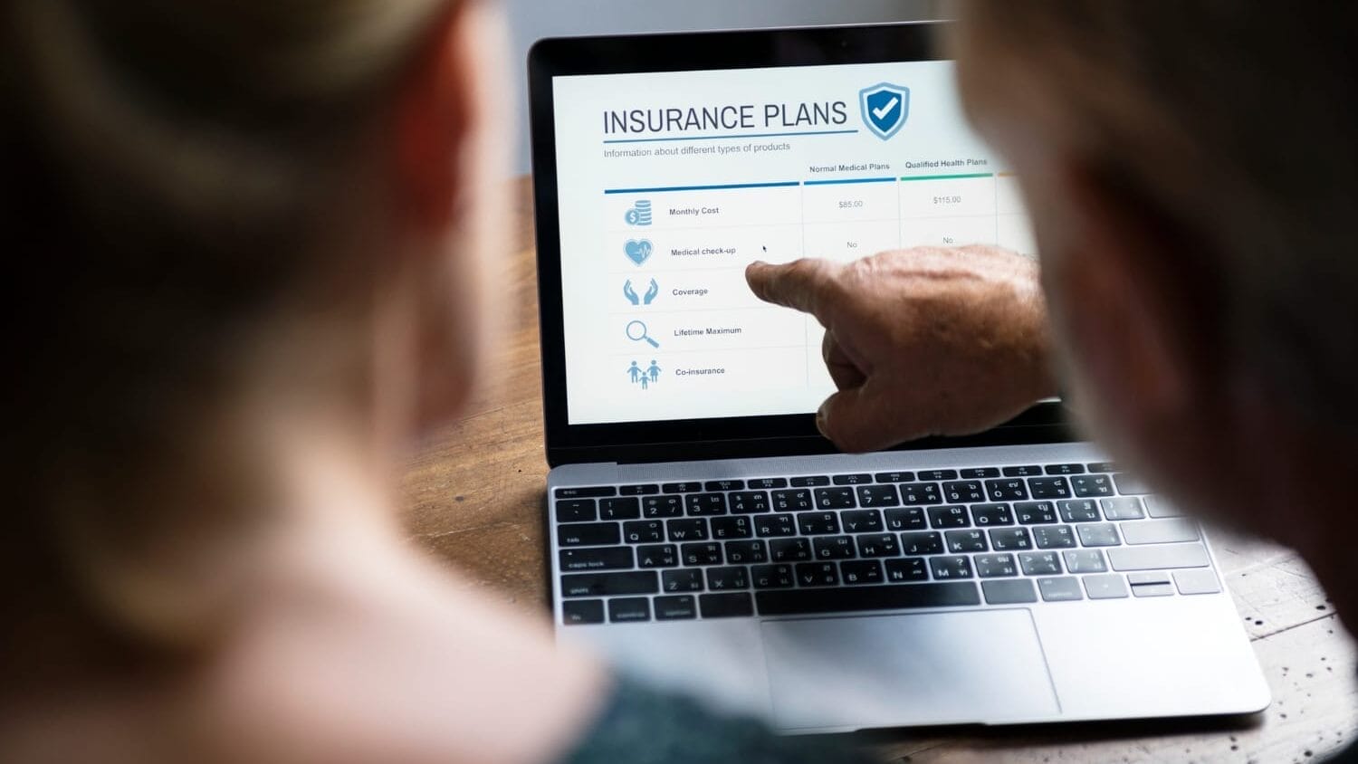 Comparing plans online to understand how much is liability insurance for a business