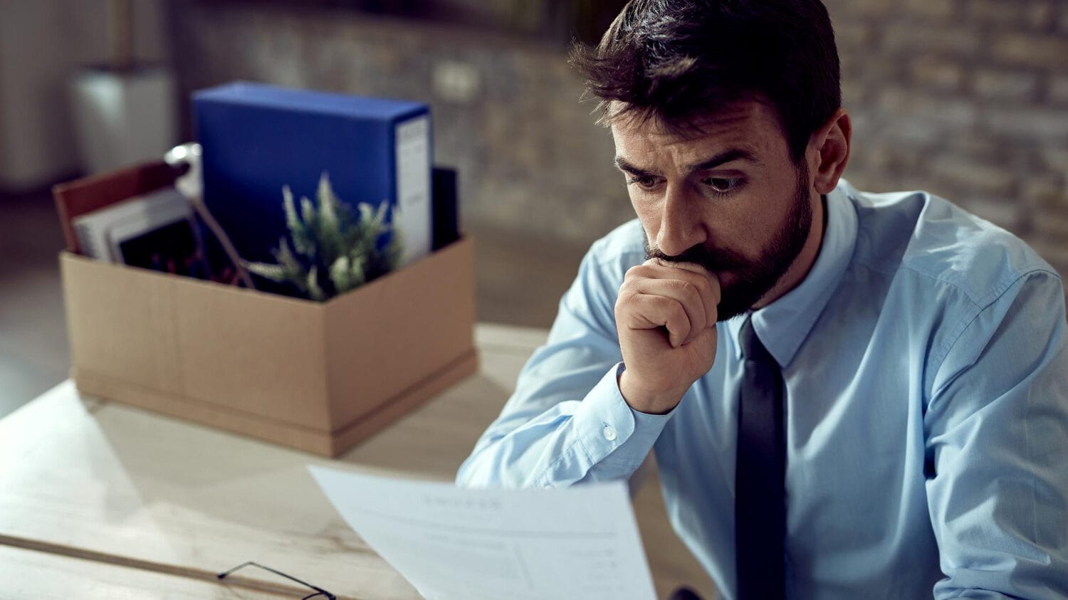 Concerned professional assessing professional liability errors omissions insurance documents