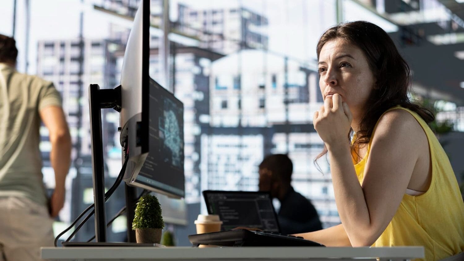 Office team reviewing information technology insurance risks