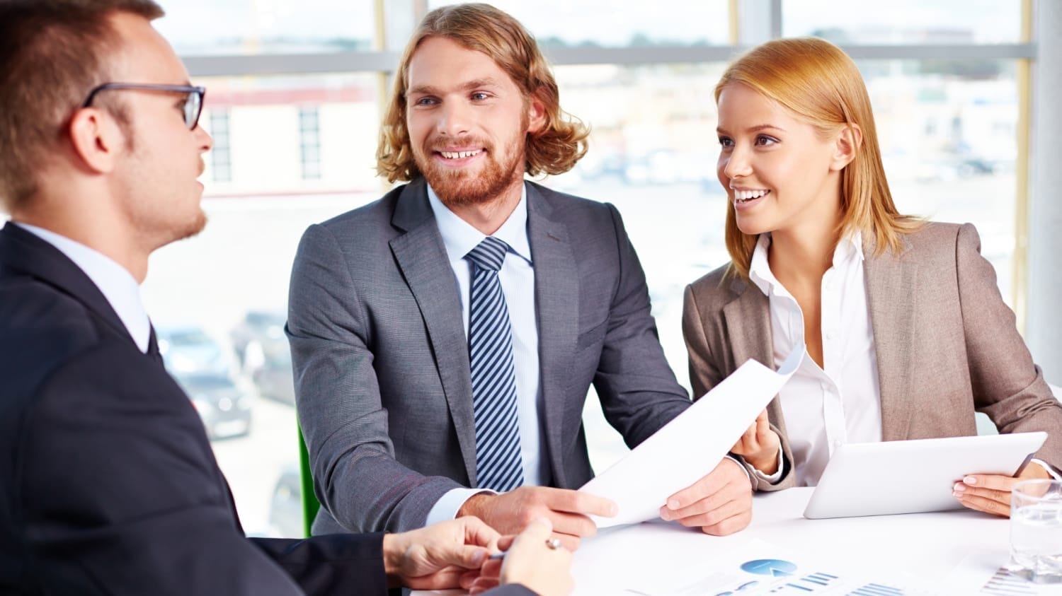 Leadership team reviewing directors and officers liability insurance