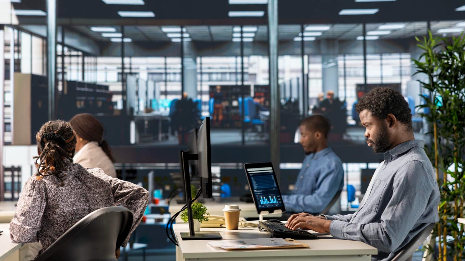 Office team working with tech business insurance planning