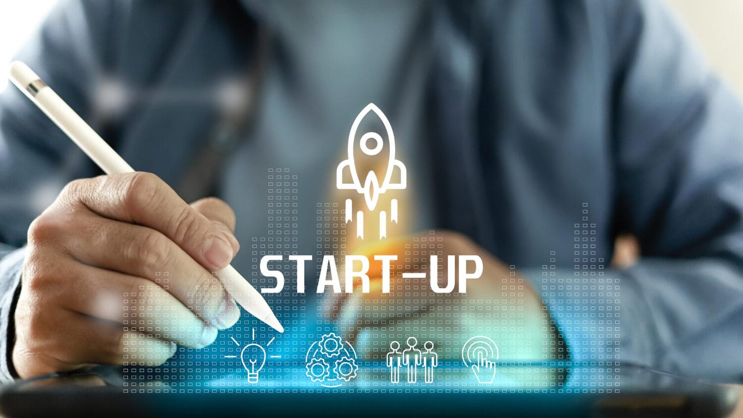 Business insurance for tech startups concept with founder using stylus and rocket graphic