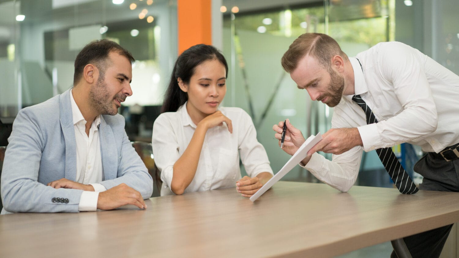 Team reviewing business insurance for technology companies