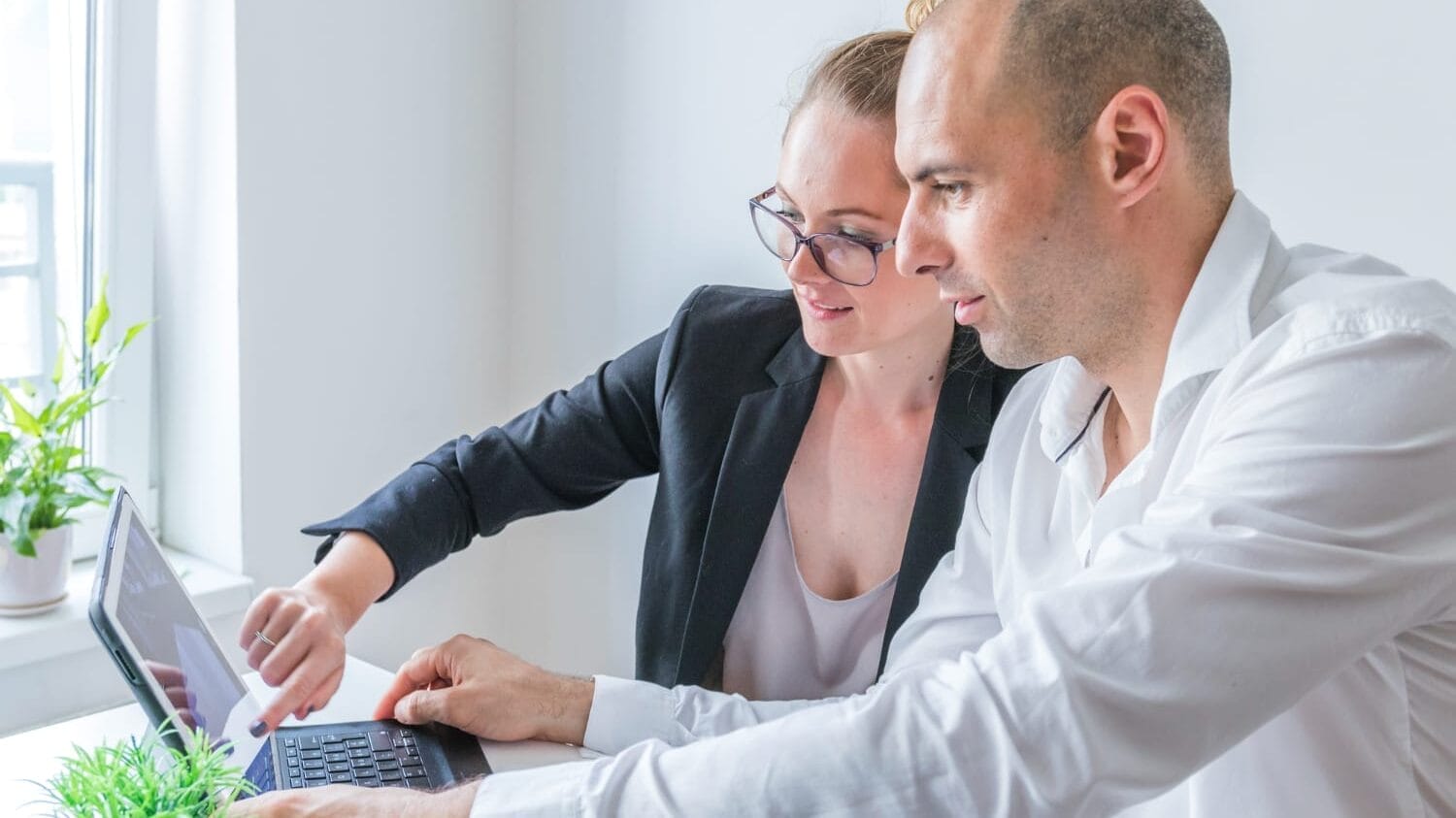 Team reviewing technology professional liability insurance options