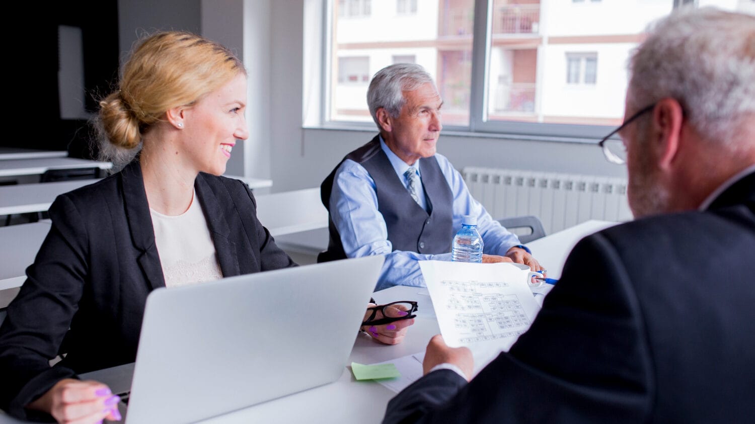 Insurance defense law firms meeting to discuss legal strategy and case planning