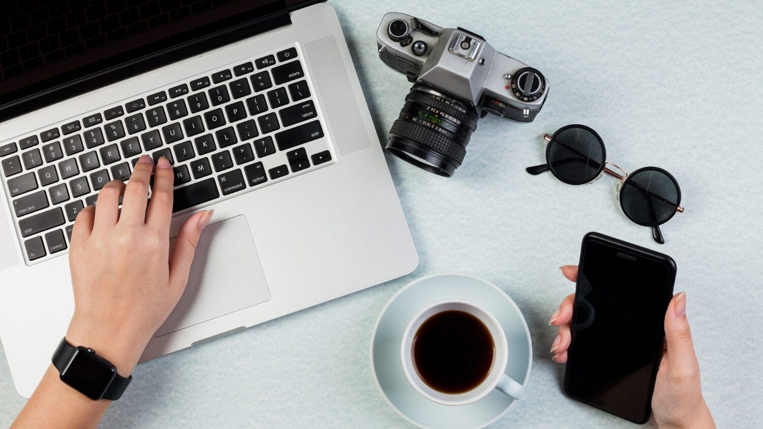 Media liability insurance for digital creators using laptop and phone