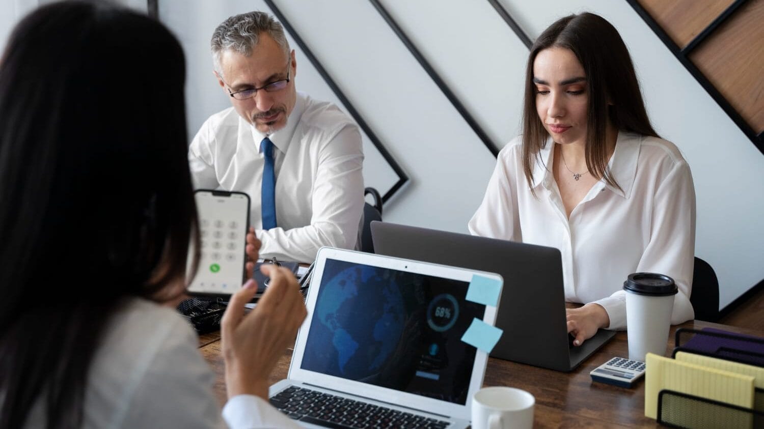 Business meeting about technology professional liability insurance