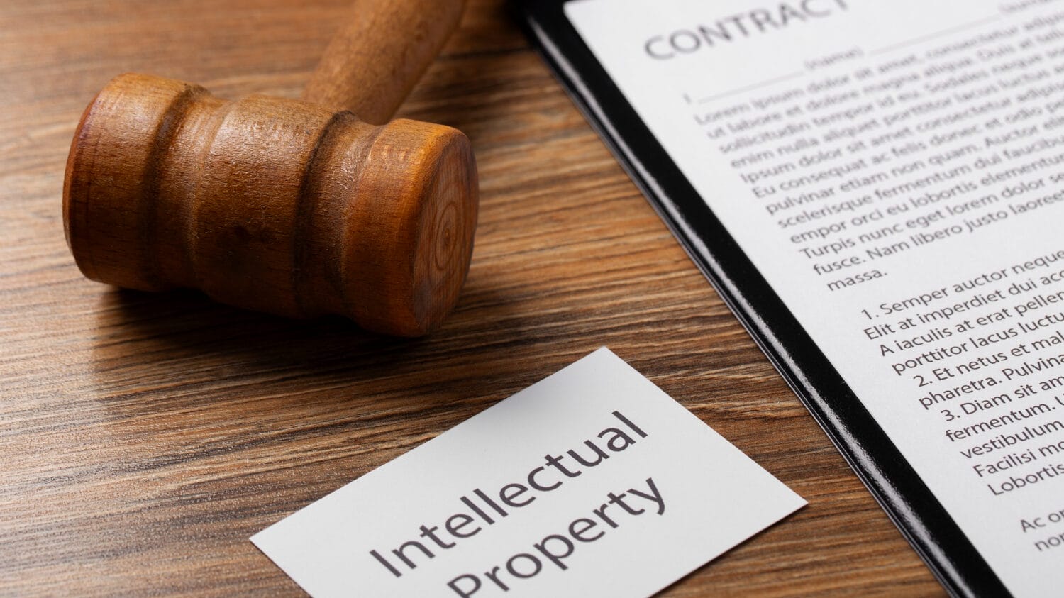 Law firm insurance coverage concept with contract, gavel, and legal paperwork