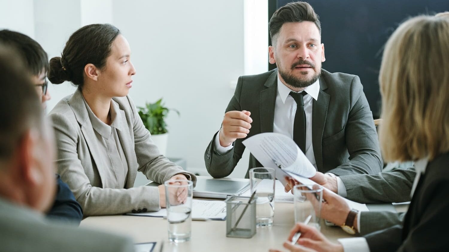 Board meeting discussing board of directors insurance