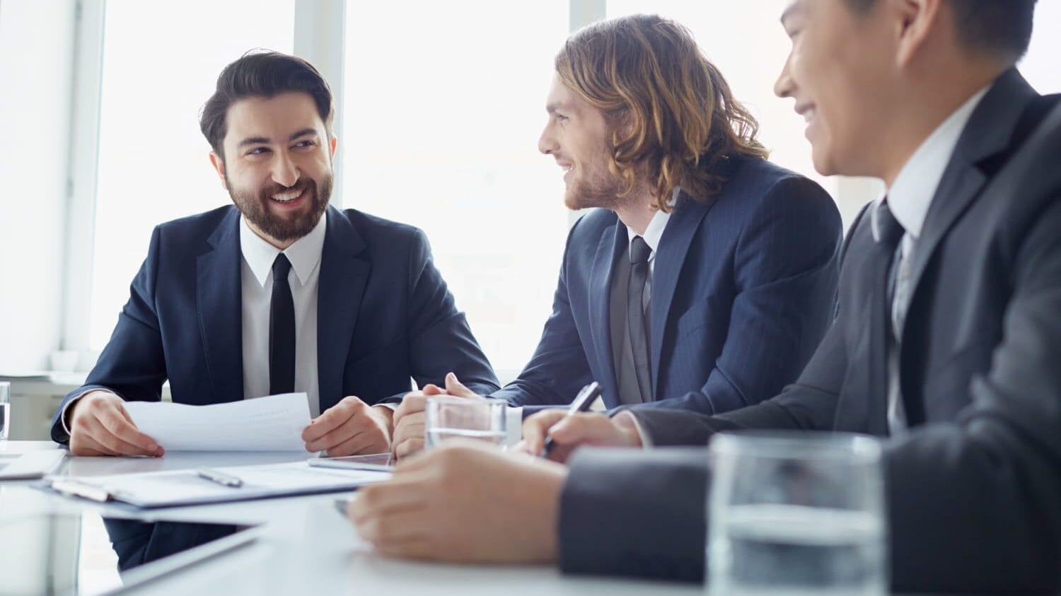 Executives reviewing board of directors insurance coverage