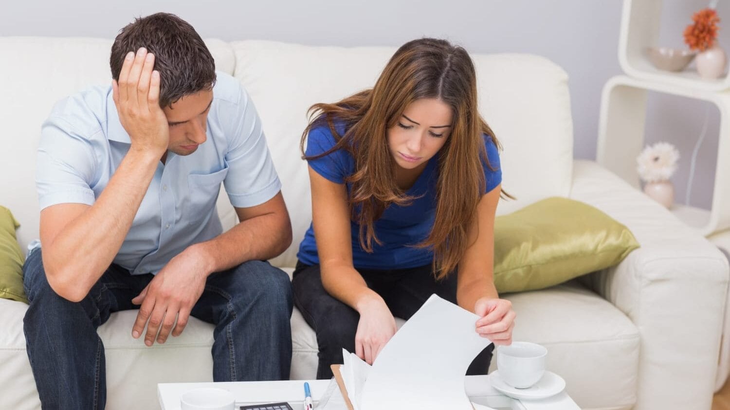 Couple discussing errors and omissions insurance coverage