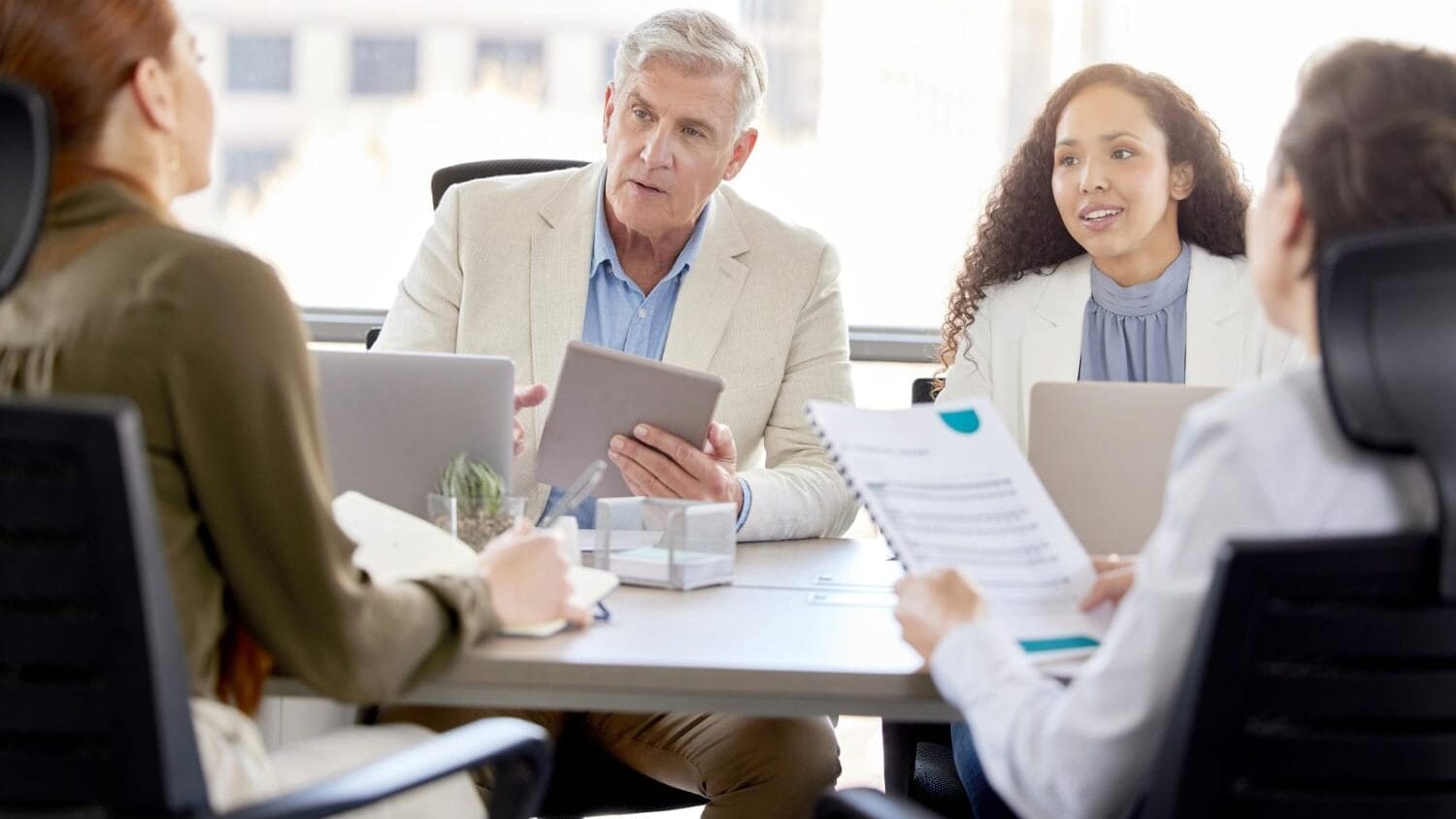 Board meeting discussing directors and officers insurance