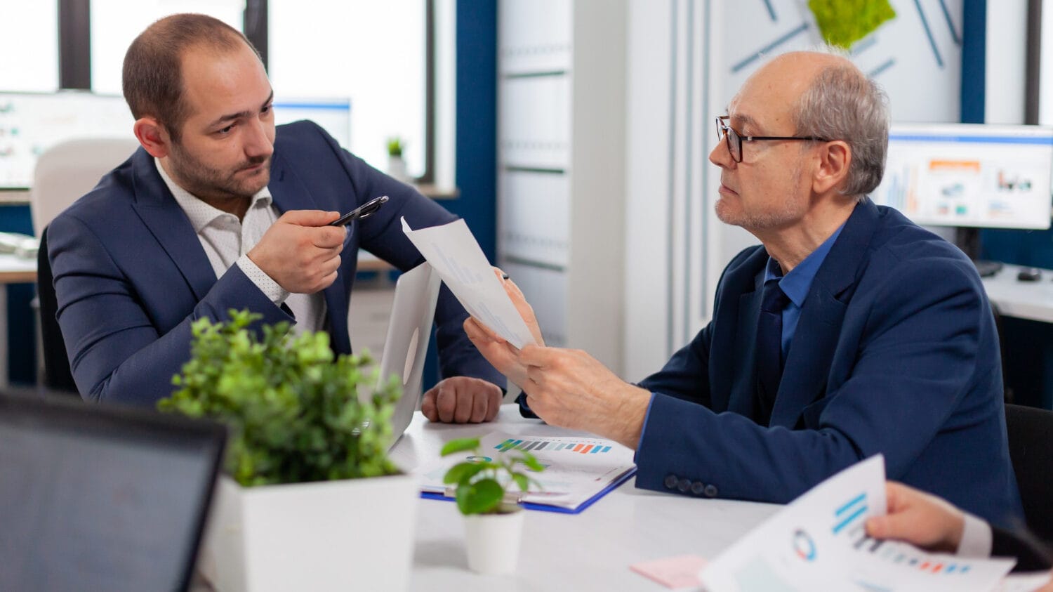 How much is business insurance discussion between advisors reviewing business costs