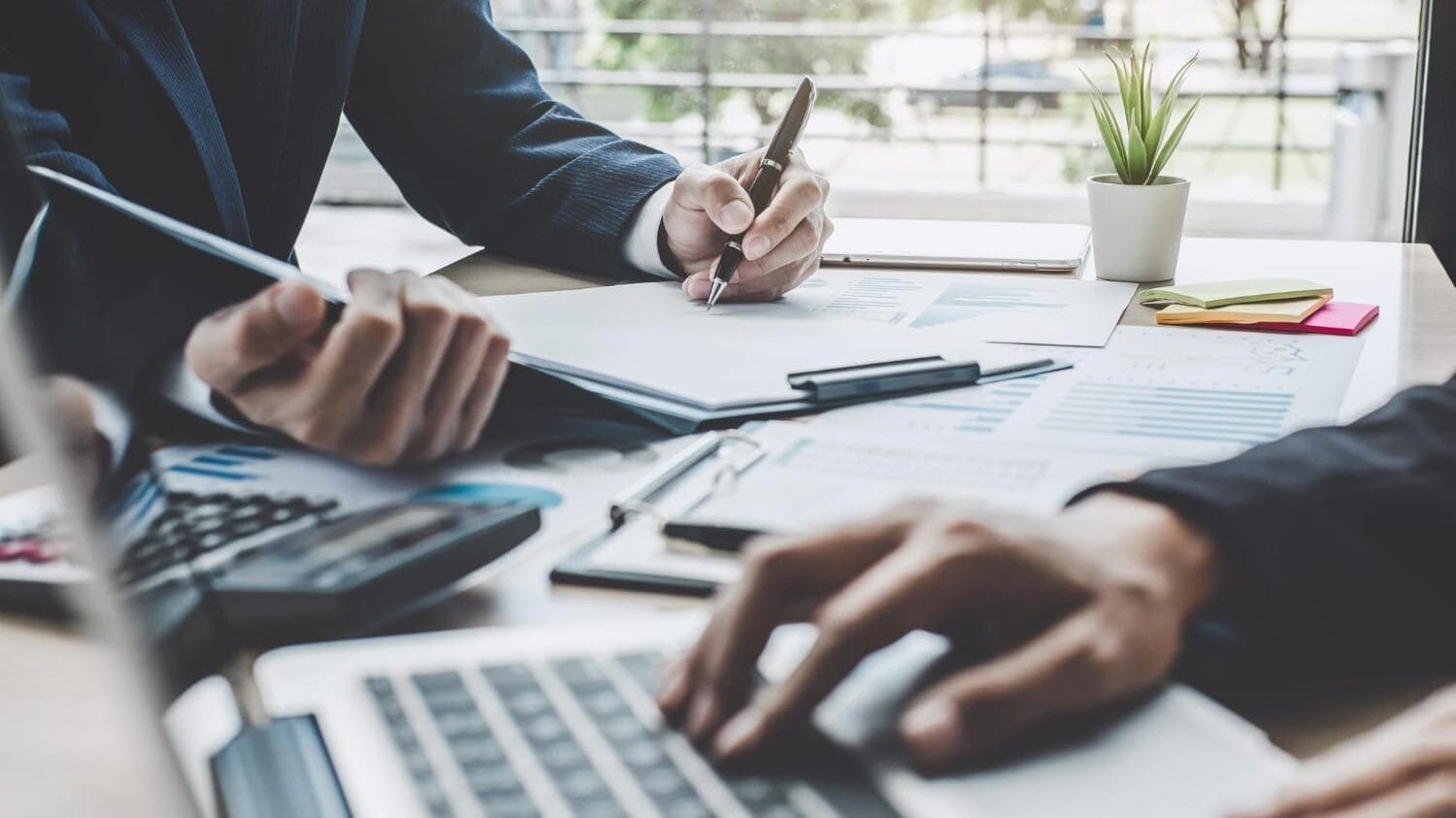 Accountants reviewing errors and omissions insurance for accountants