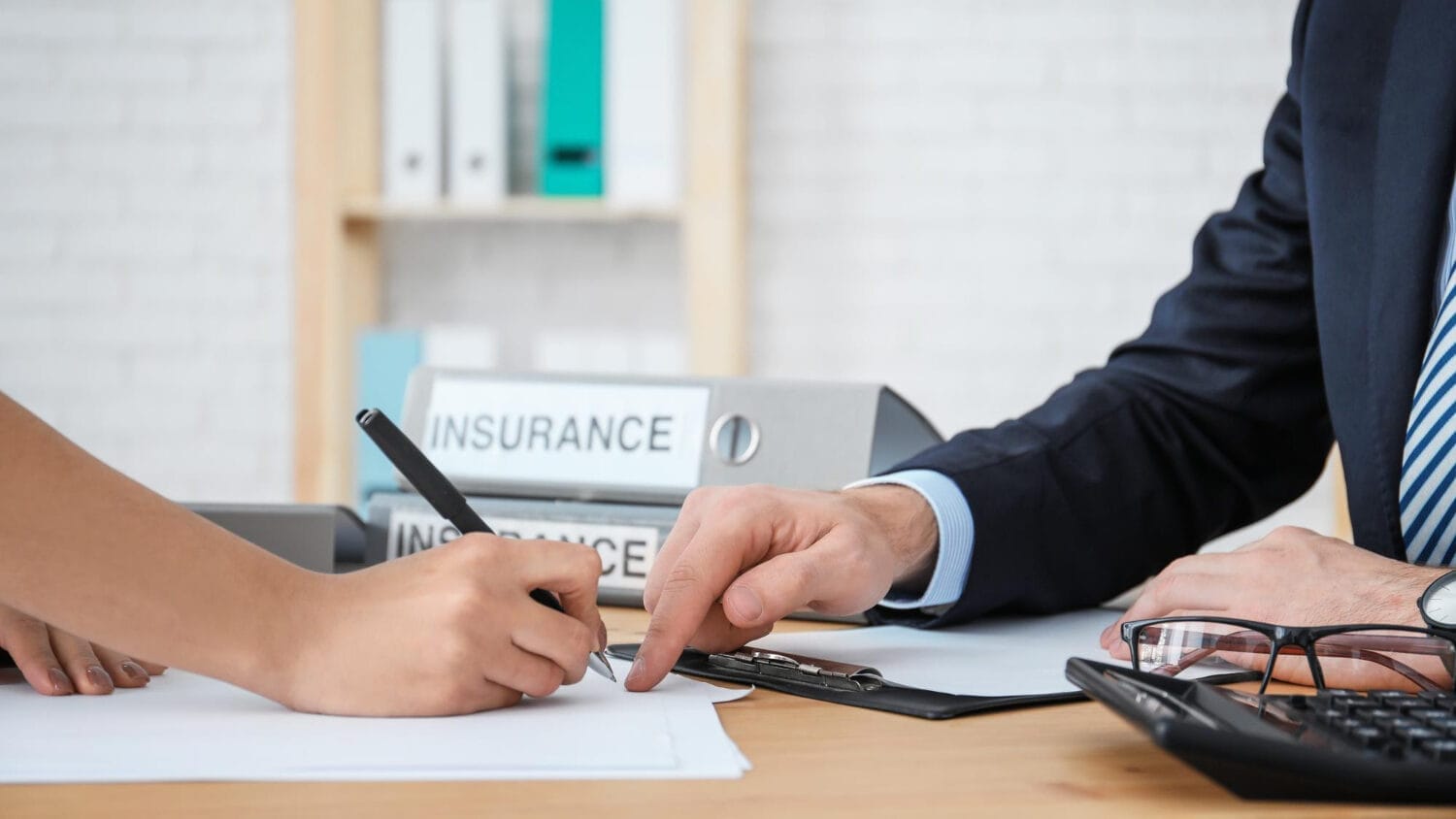 Professional liability insurance for CPAs document signing with insurance advisor
