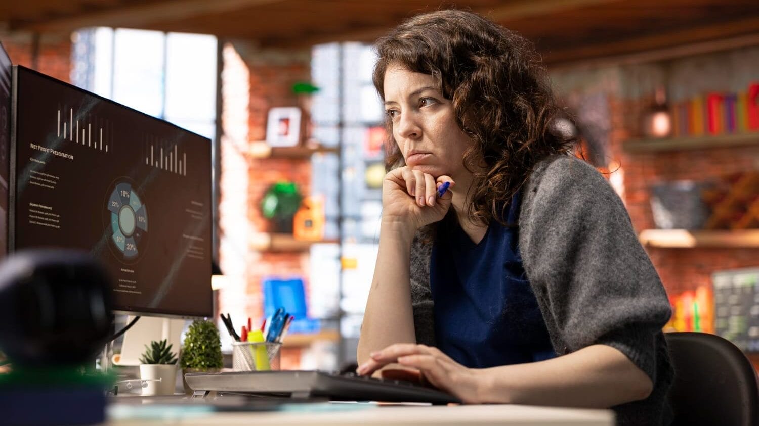 AI consultant analyzing business data on screen