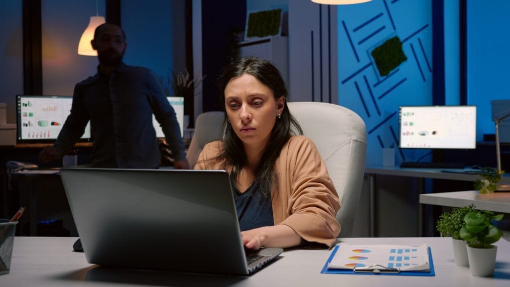 Business owner reviewing cyber liability insurance risks