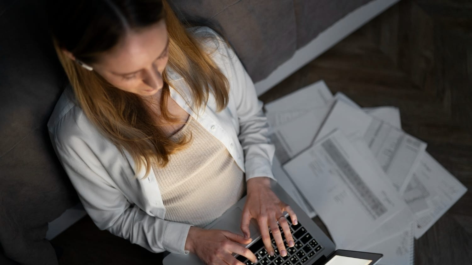 Business owner reviewing Cloud Outage Insurance documents
