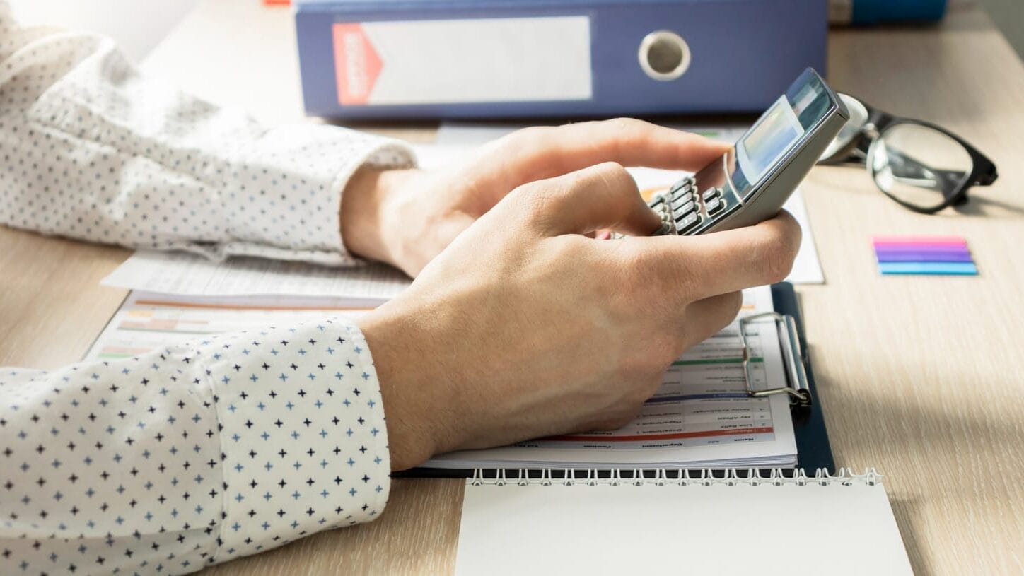 Reviewing Pay Transparency Laws with calculator